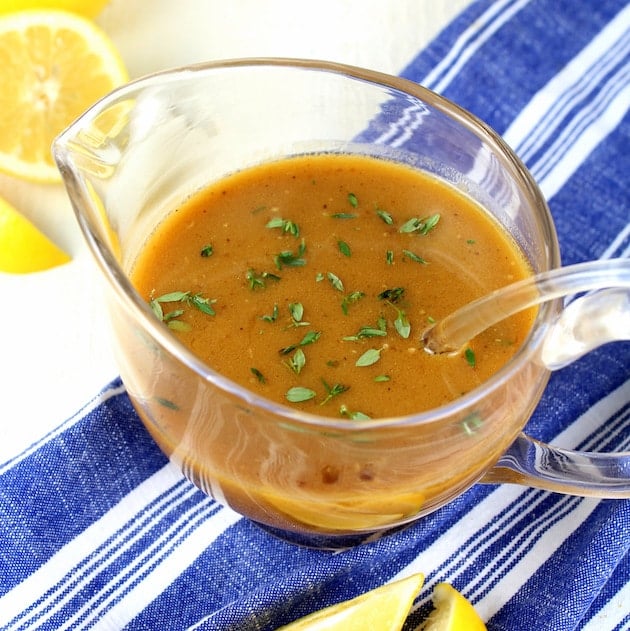 White wine gravy in glass pitcher