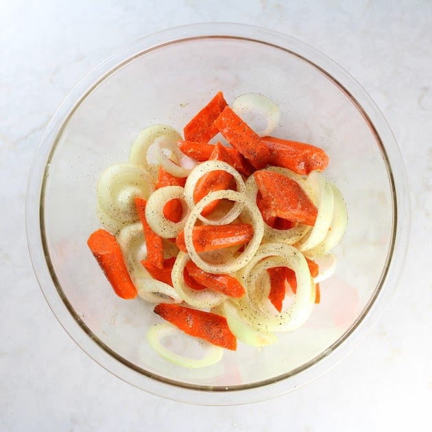 Chopped carrots and onions in bowl