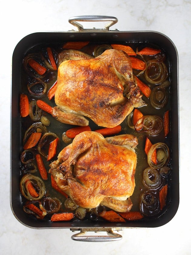 Lemon Thyme Oven Roasted Chicken Cooked chickens in roaster pan