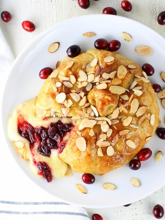 Baked Brie on plate over top 