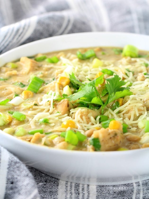 Creamy White Chicken Chili with Great Northern Beans Recipe &amp; Image: Bowl of chili at eye level