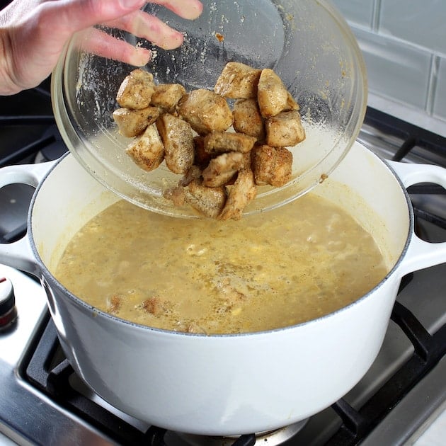 Creamy White Chicken Chili with Great Northern Beans Recipe &amp; Image: adding chicken to chili