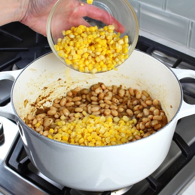 Creamy White Chicken Chili with Great Northern Beans Recipe &amp; Image: Adding corn to chili