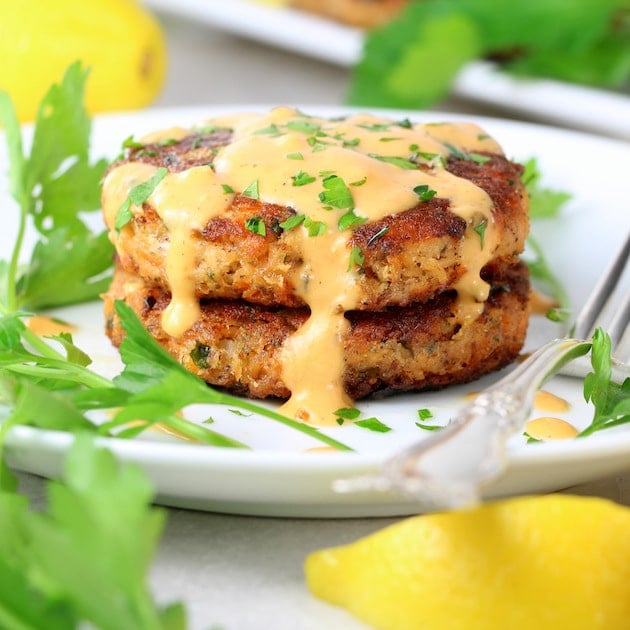 Easy Low Carb Salmon Patty cakes on plate with aioli