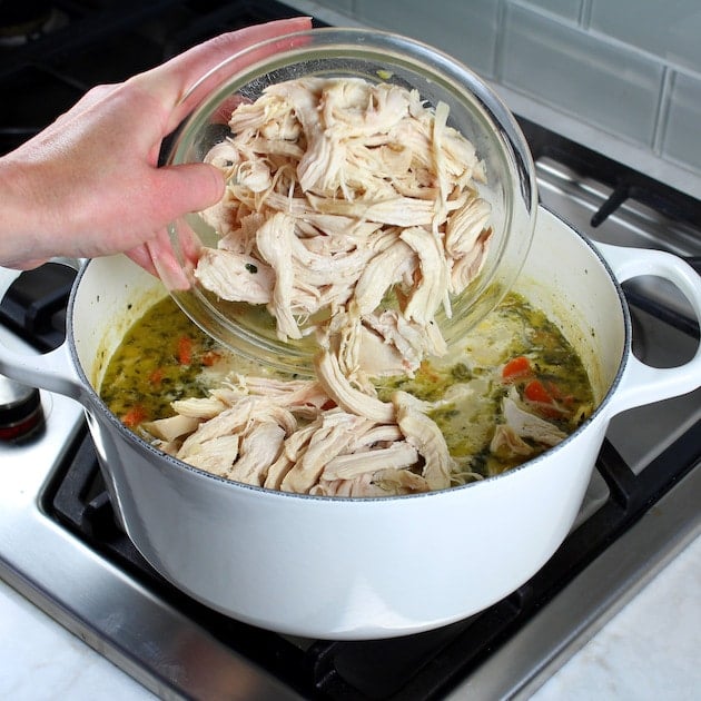 How to make Creamy Tortellini Soup with Chicken - adding shredded chicken to soup