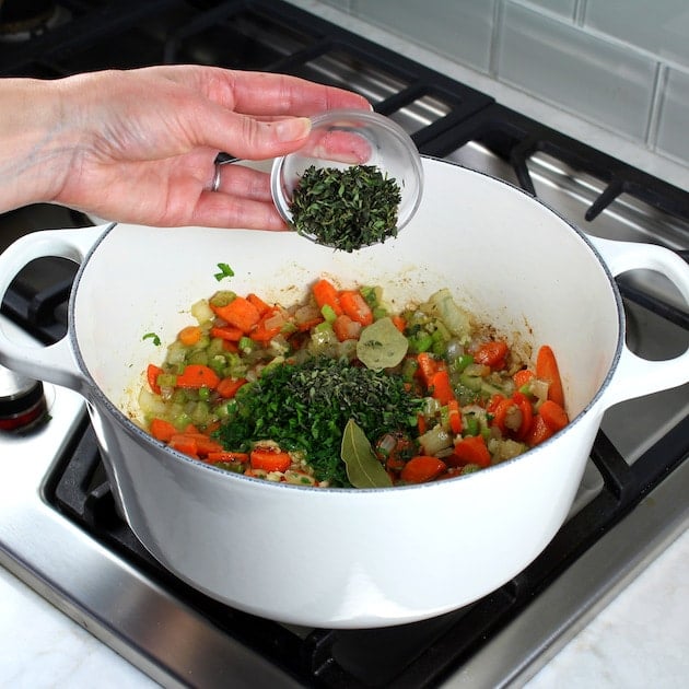 How to make Creamy Tortellini Soup with Chicken - adding herbs