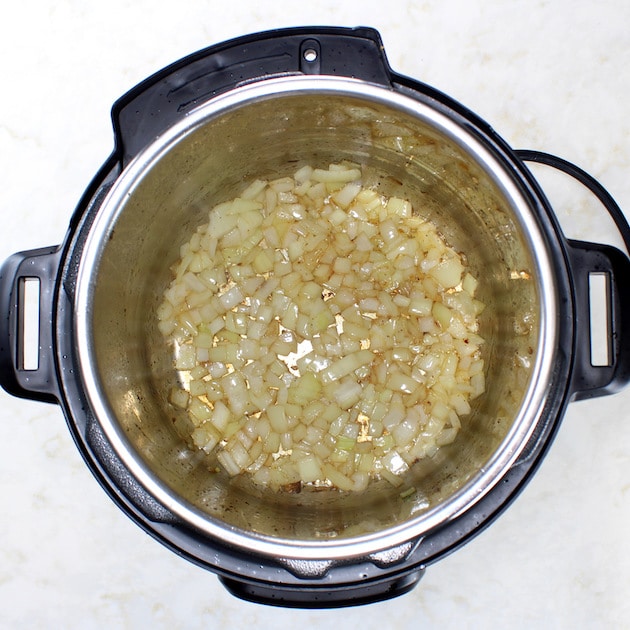 How to make Easy Instant Pot Chicken and Rice - cooking onions in instant pot