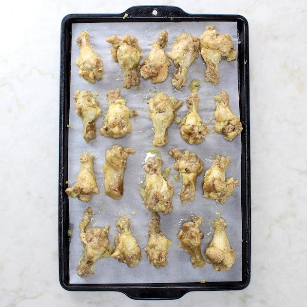 Instant Pot Garlic Parmesan Chicken Wings on a baking sheet