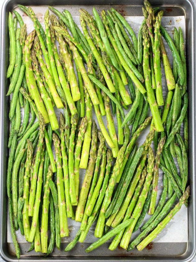 Asparagus Egg and Bacon Salad with Dijon Vinaigrette Image - Roasted Green Beans and Raw Asparagus on Baking Sheet