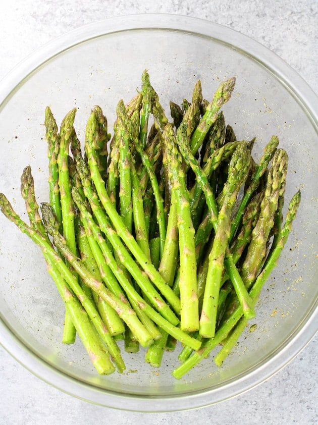 Raw asparagus tossed with olive oil, salt and pepper.