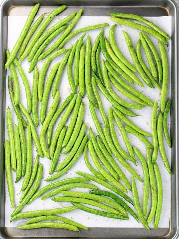 Raw Green Beans on a Baking Sheet.