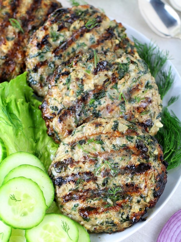 Cooked Chicken Burger Patties on a platter - Image