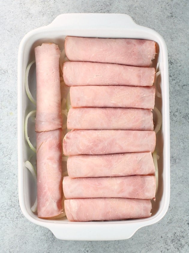 Casserole dish with ham-rolled chicken tenders