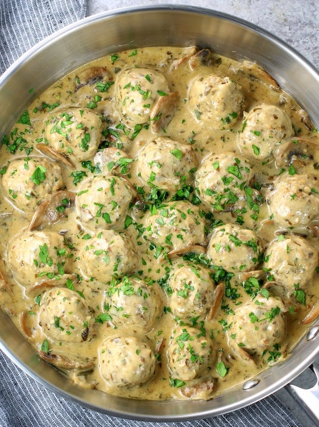 Saute pan full of creamy parmesan turkey meatballs