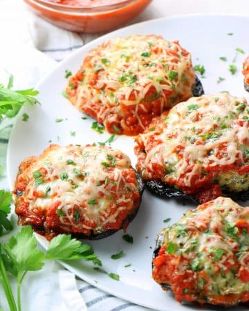 Portobello Mushrooms stuffed with Chicken Parmesan and covered in melted cheese