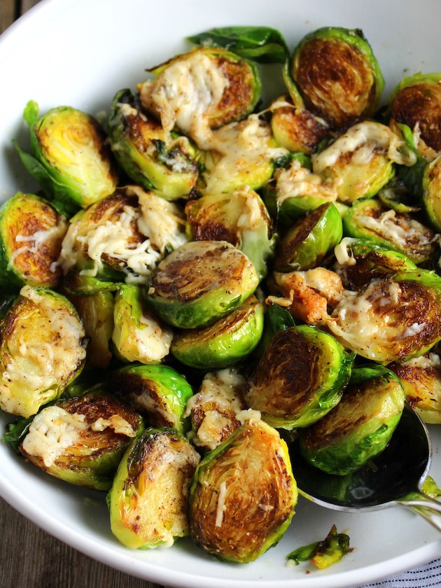 Sauteed Brussels Sprouts with melted cheese in a bowl
