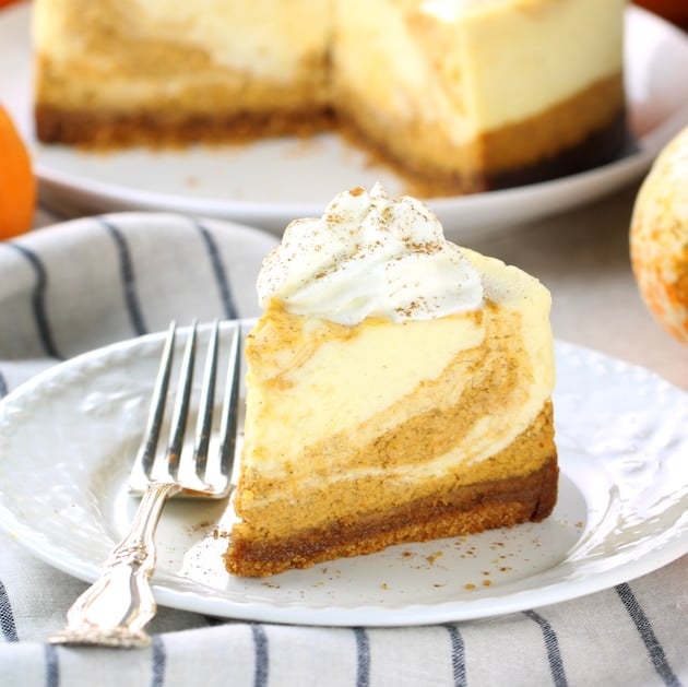 https://tasteandsee.com/wp-content/uploads/2019/11/SQ-The-Best-Instant-Pot-Marbled-Pumpkin-Cheesecake-Recipe-EL-slice-and-cake-2-001.jpg
