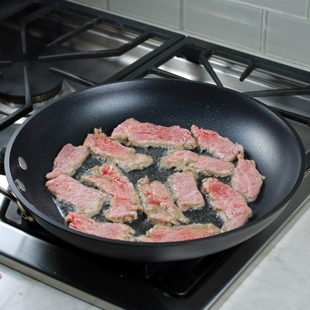 searing beef on stovetop