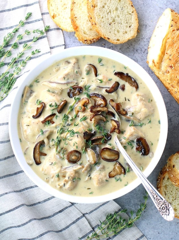 Mushroom and Chicken soup in a bowl with crostini