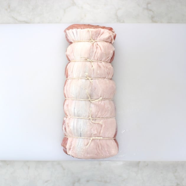 Pork tender loin tied up with twine