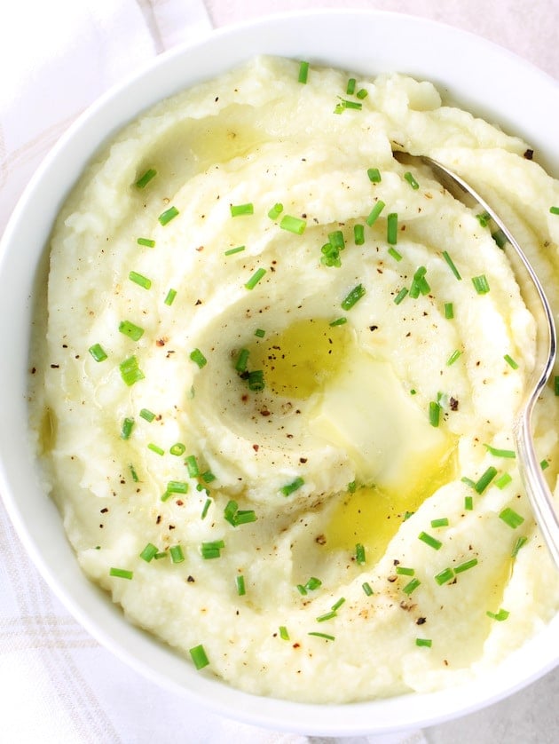 Bowl of mashed cauliflower with melted butter