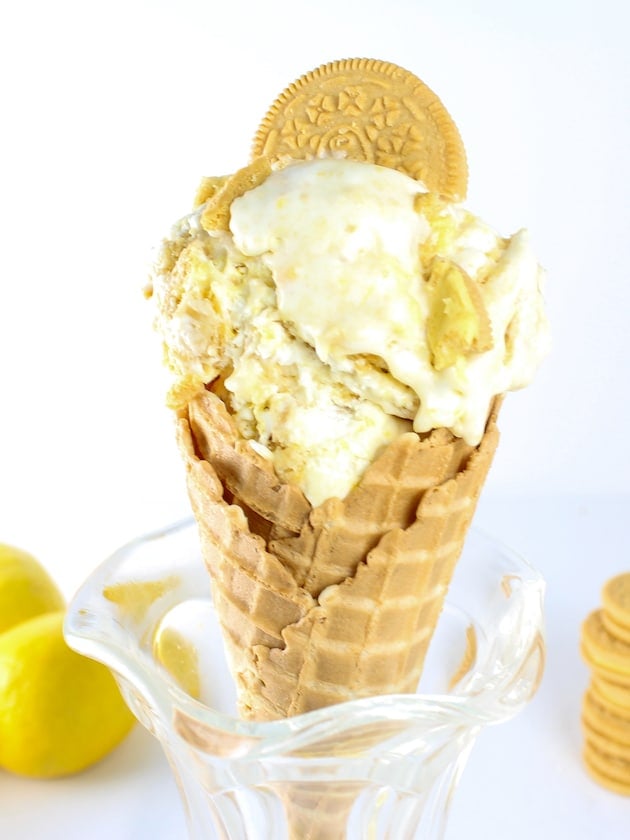 Sugar cone of lemon ice cream with a lemon oreo, in a parfait dish