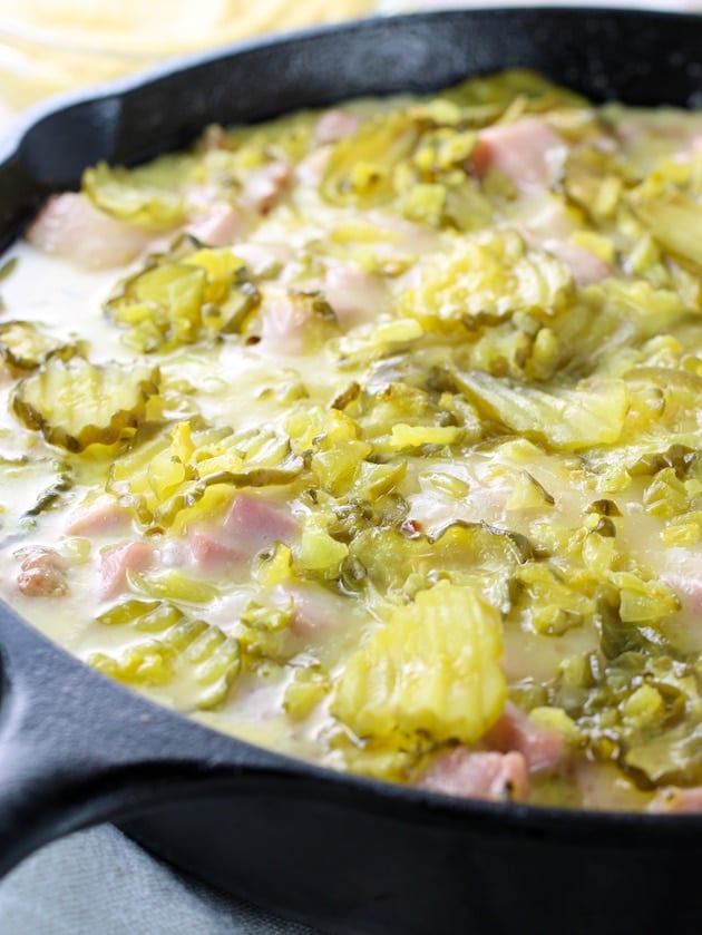 Close up partial eye level cast iron skillet of cuban casserole