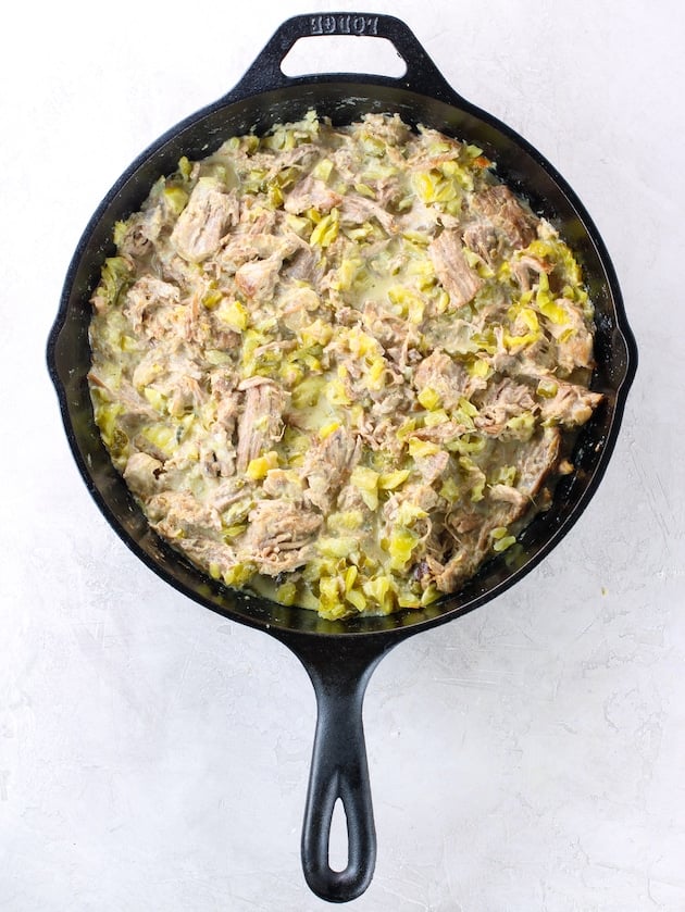 cast iron skillet with pork ham swiss pickle casserole