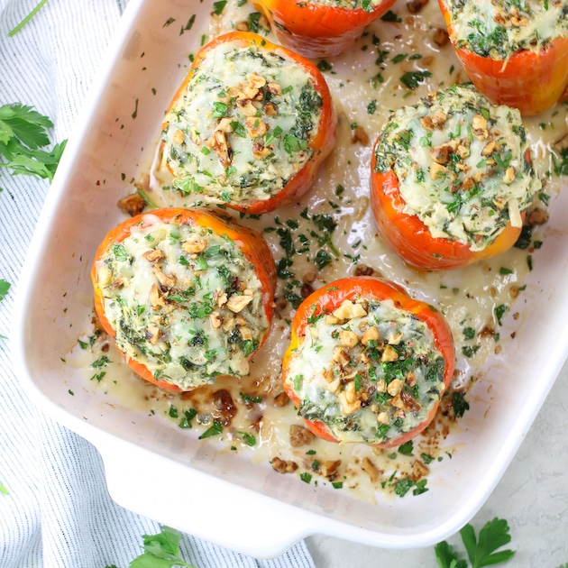 partial baking dish of chicken Florentine stuffed peppers