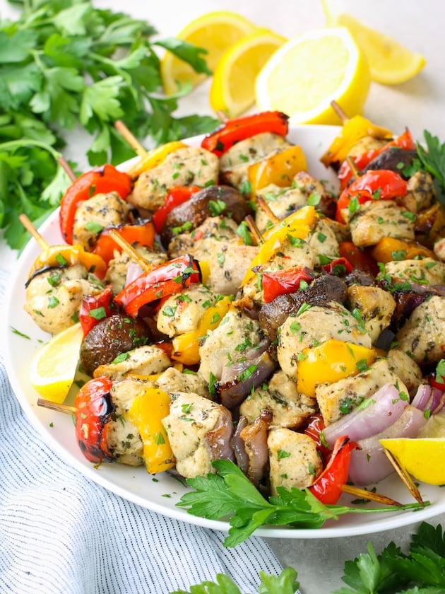 partial platter of Greek air fryer chicken kabobs