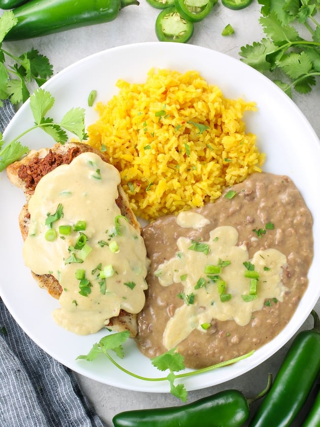 Plate of rice, beans, and mexican chori pollo