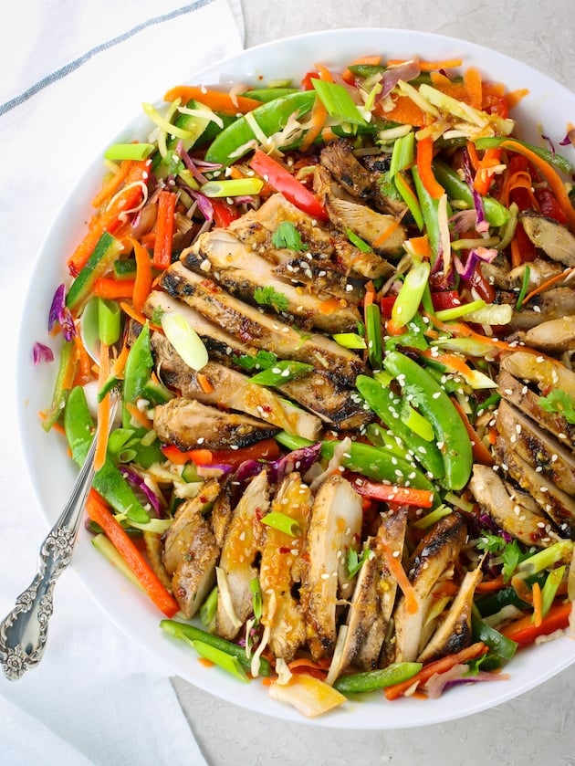 Partial plate of Asian Slaw With Grilled Chicken