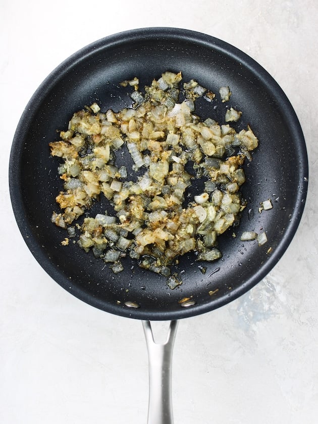 Garlic and onions sautéed in a non-stick pan.