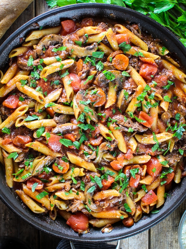 Crock-Pot Beef Ragu with Penne in a skillet very close