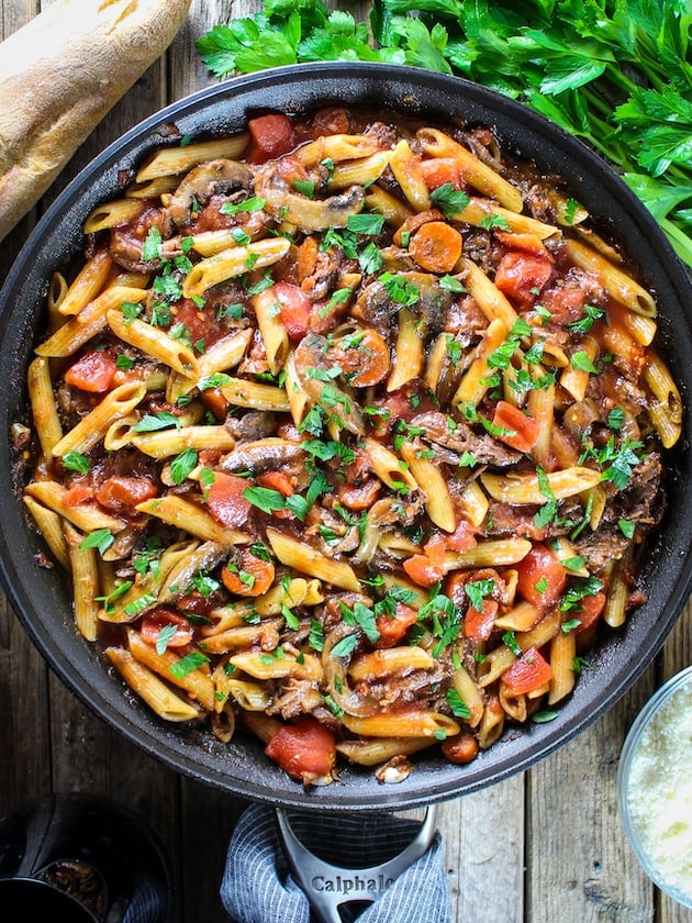 A shot of Crock-Pot Beef Ragu with Penne in a skillet