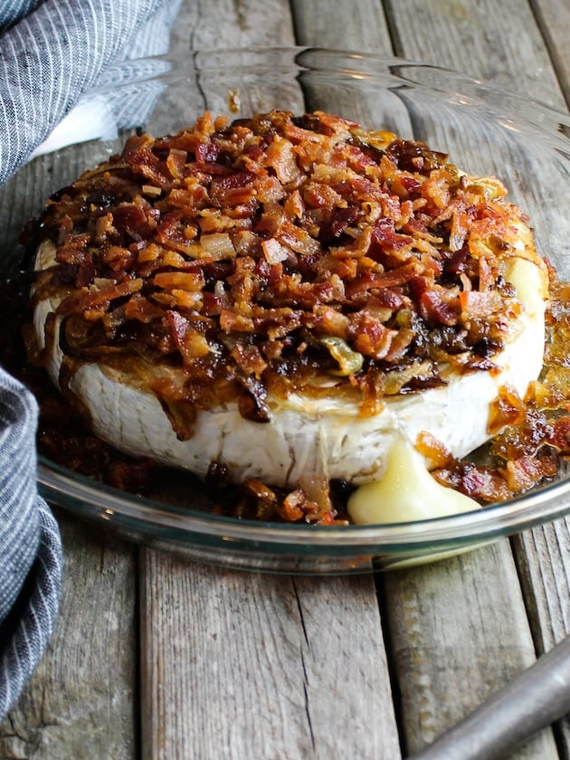 Baked Brie topped with Caramelized Onions and Bacon, in a pie dish