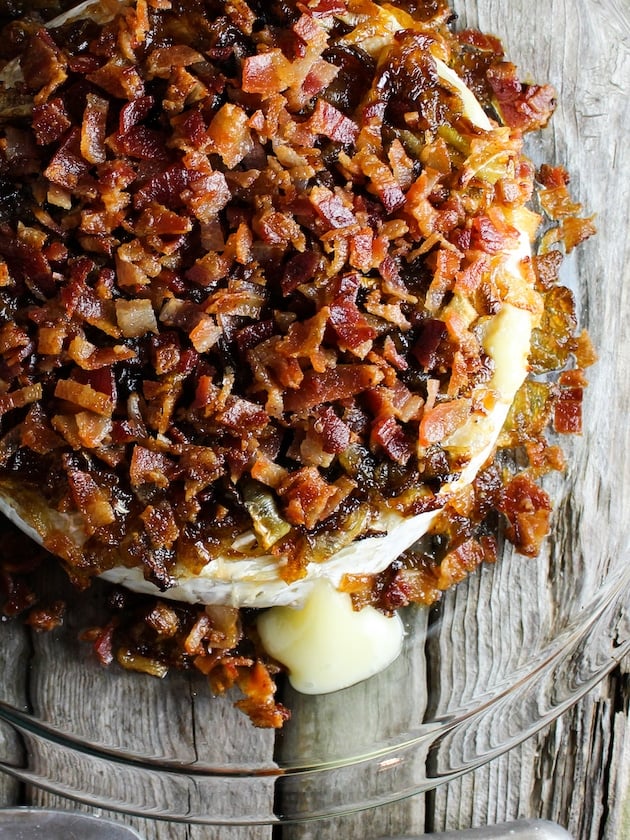Double cream Brie baked and covered in Caramelized Onions and Bacon