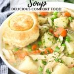 A bowl of chicken pot pie soup with a baked puff pastry shell.