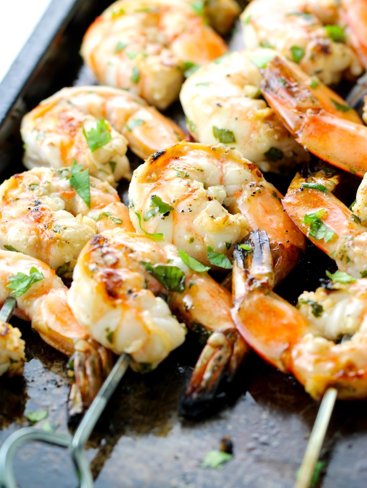 A close-up photo of grilled shrimp.