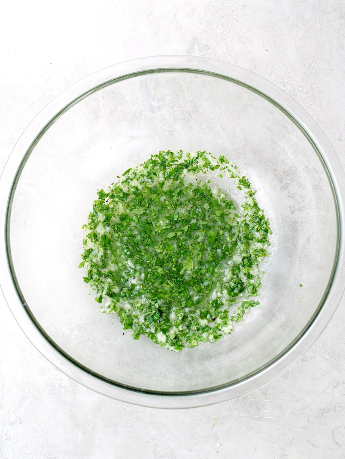 Cilantro lime marinade in a glass bowl.
