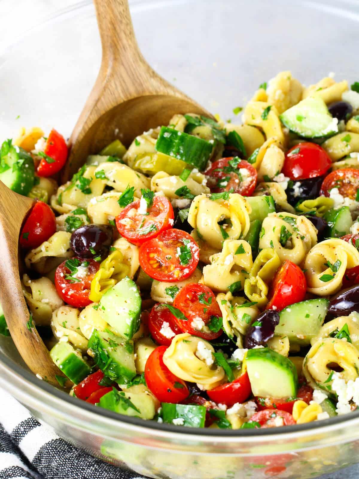 A close-up photo of Greek Tortellini Pasta Salad.