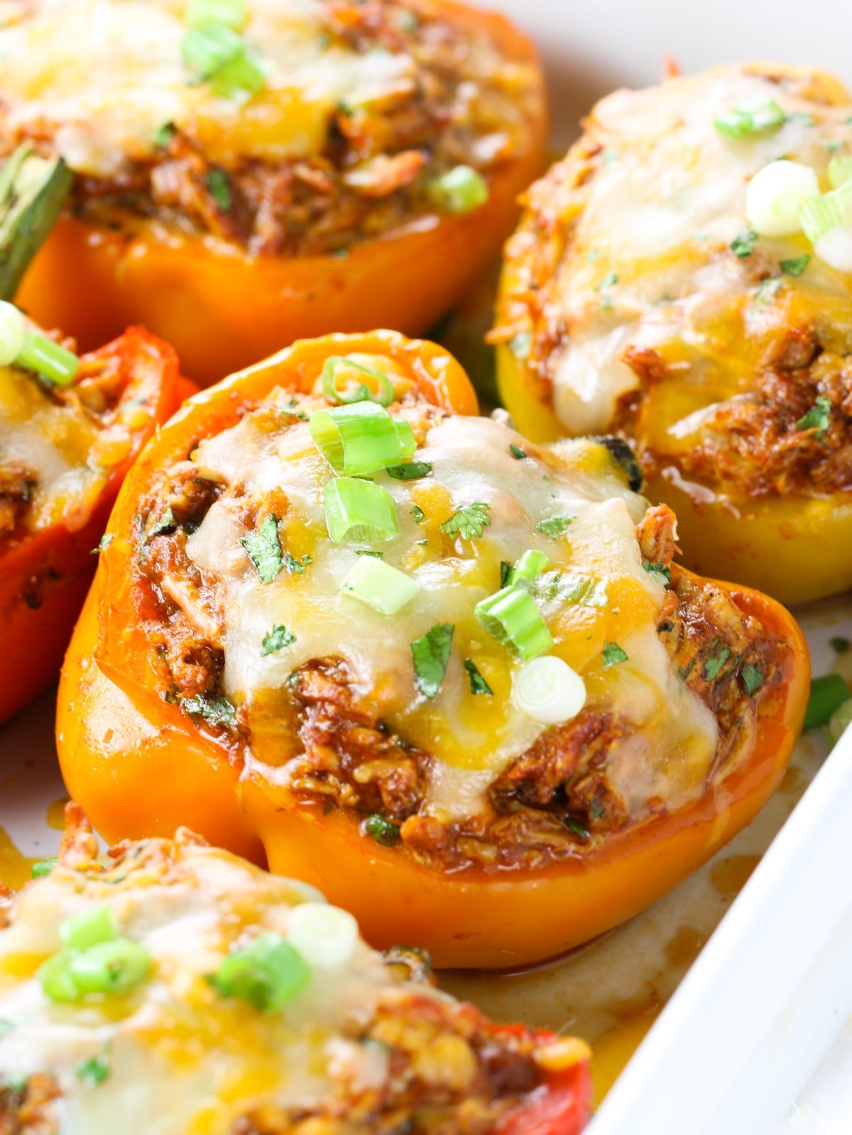 A close-up shot with cooked zesty stuffed peppers.