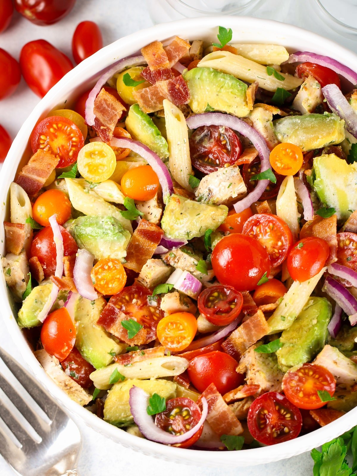 Partial bowl of BBQ Chicken Bacon Ranch pasta salad up close.