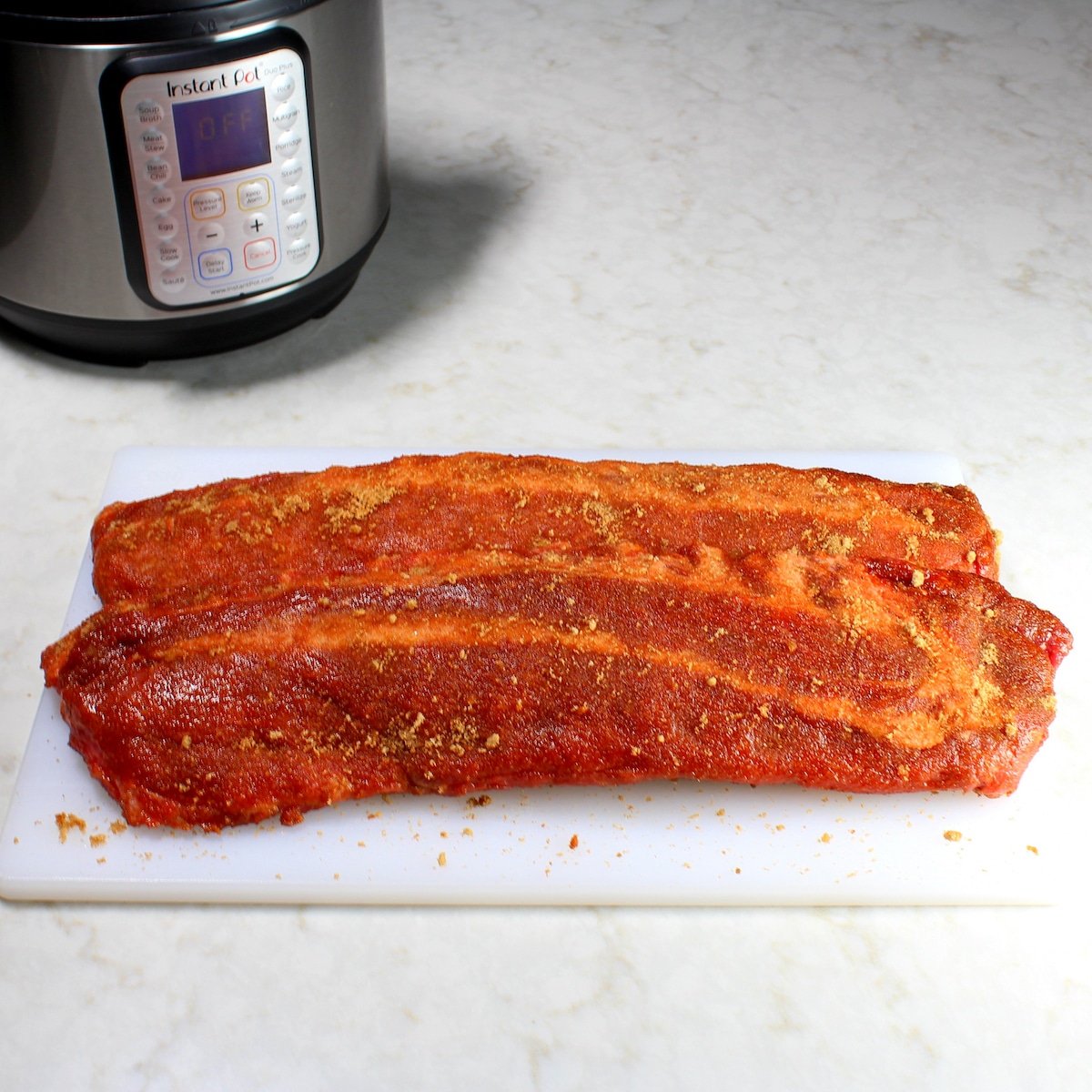 Rib with spices and seasonings rubbed onto the meat.