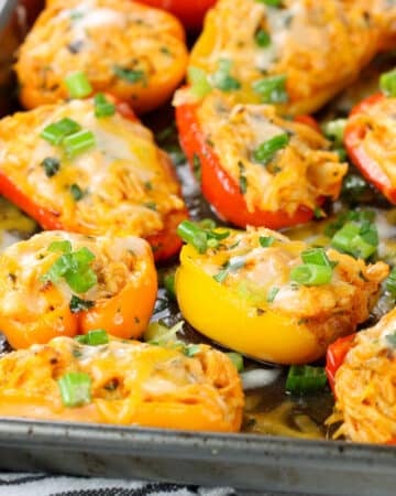Buffalo Chicken Baby Bell Peppers cooked on a baking sheet.