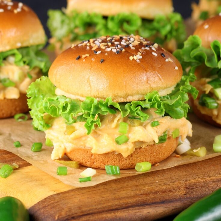 Instant Pot Jalapeño Popper Chicken added to a bun and made into a slider.