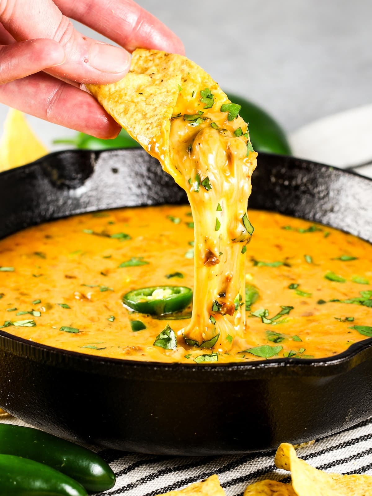 Easy appetizers - Queso Fundido with Chorizo inn a cast iron skillet.