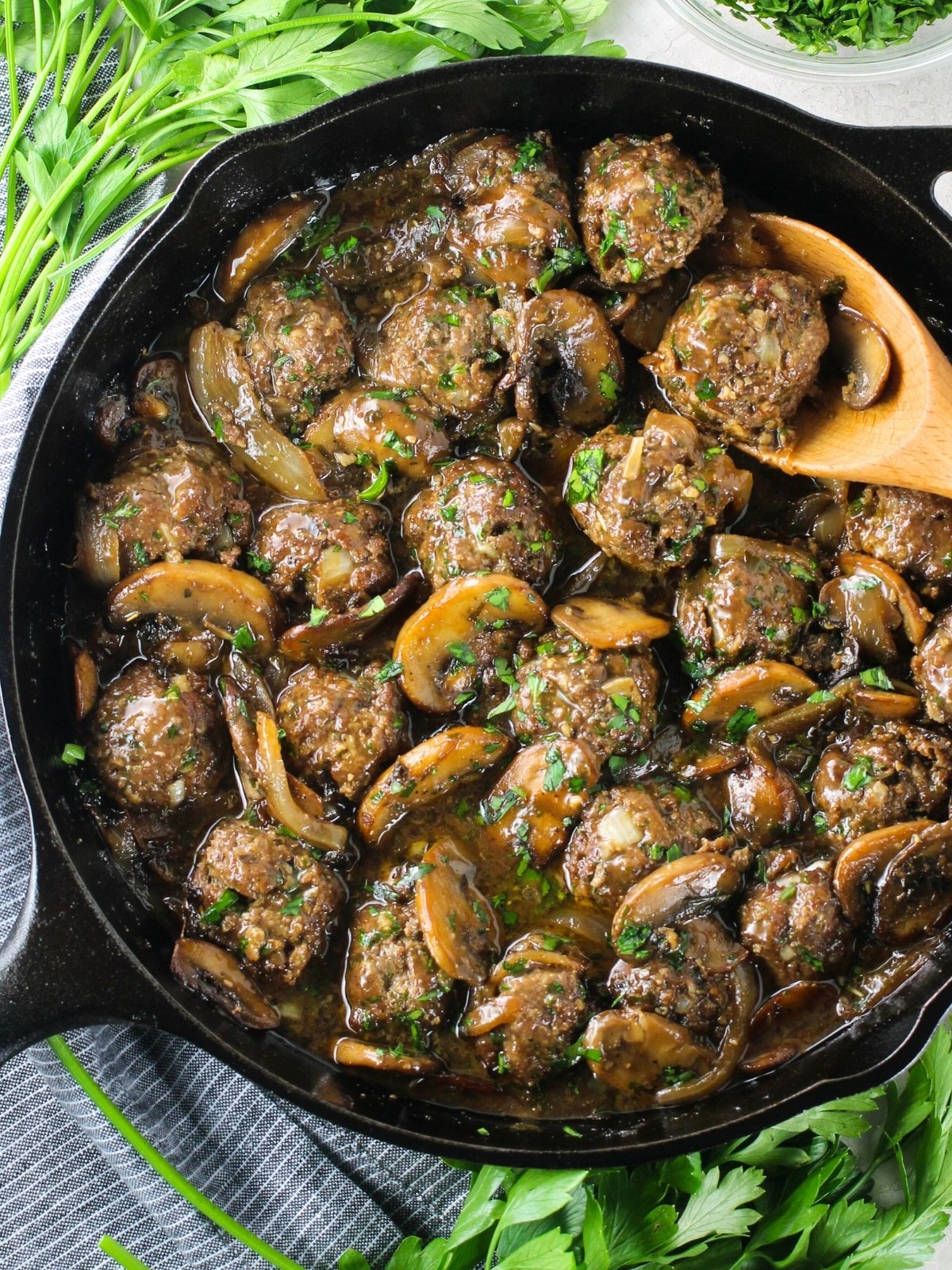 Salisbury Steak Meatballs in a cast iron skillet.