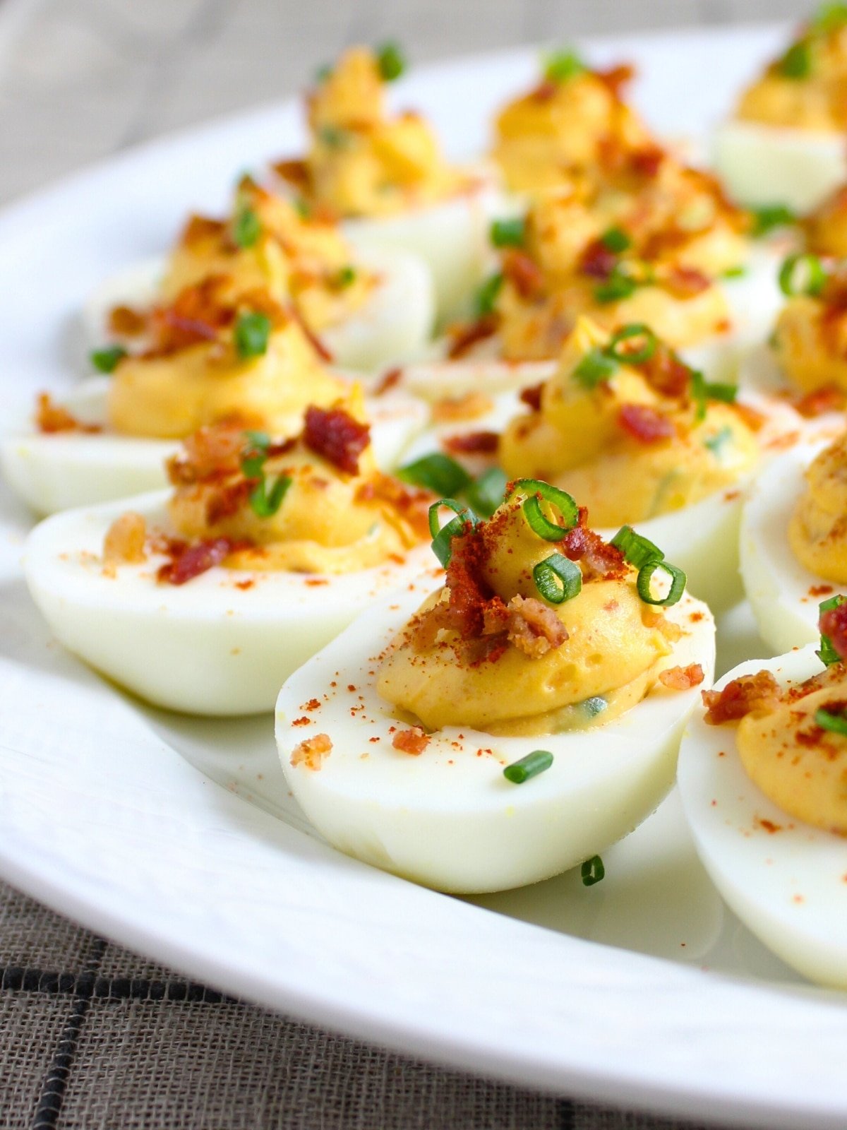 Smoky Deviled Bacon and Eggs on a platter - a delicious appetizer.