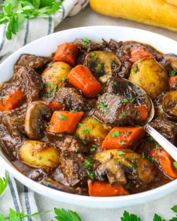 A bowl of Ultimate Beef Stew with Mushrooms.